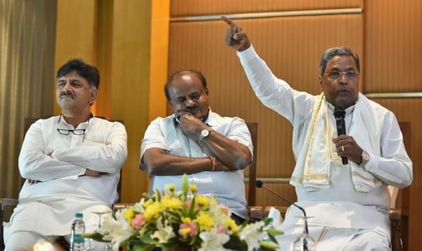 Chairman of Co-ordination committee Siddaramaiah  with Chief Minister of Karnataka, H D Kumarswamy and Irrigation Minister  D K Shivkumar  during a joint press at a City Hotel, on October 20, 2018 in Bengaluru. (Photo by Arijit Sen/Hindustan Times via Getty Images) 