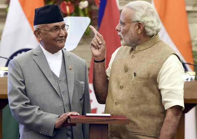 Prime Minister Narendra Modi with Nepal Prime Minister Khadga Prasad Sharma Oli. (Sonu Mehta/Hindustan Times via Getty Images)