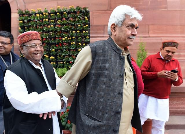 Union Minister Manoj Sinha (centre) during the winter session of Parliament  (Photo by Sonu Mehta /Hindustan Times via Getty Images)