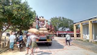A truck being loaded with lemons at the Podalakur market to be sent to north India.&nbsp;