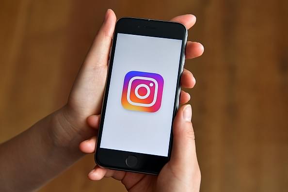 Instagram has a powerful influence over young teens and adults. (Photo by Carl Court/Getty Images)