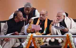Prime  Minister Narendra Modi, BJP President Amit Shah and Finance Minister  Arun Jaitley during a conversation at BJPs two-day national council meeting. (Pankaj Nangia/India Today Group/Getty Images)&nbsp;