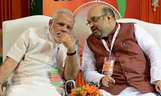 Prime Minister Narendra Modi with BJP president Amit Shah. (Photo credit:  RAVEENDRAN/AFP/Getty Images))