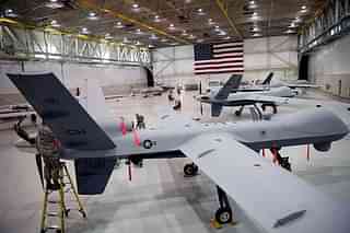 MQ-9 Reapers parked in a US Air Force hangar in Nevada (Isaac Brekken/Getty Images)