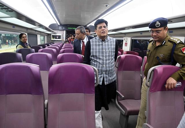 Railway Minister Piyush Goyal inspects the country’s fastest T-18 train.  (Photo by Qamar Sibtain/India Today Group/Getty Images)