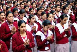Girls participating in morning prayer meeting at Sarvodaya Kanya Vidyalaya in New Delhi, India. (Priyanka Parashar/Hindustan Times via Getty Images) 