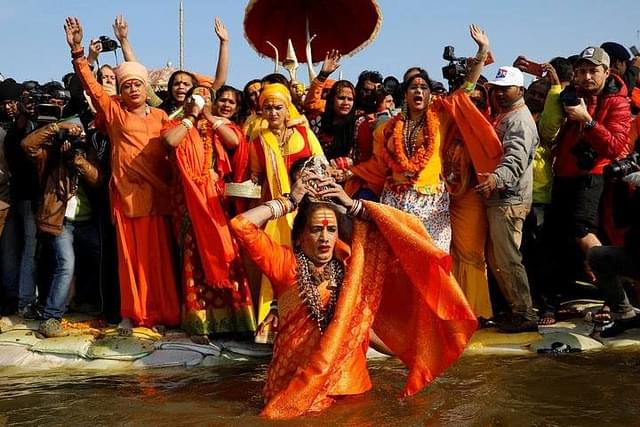 Lakshmi Narayan Tripathi, chief of the “Kinnar Akhada” congregation for transgender people takes a dip during the first “Shahi Snan” (grand bath)(Source:MarcAngeli/Facebook)