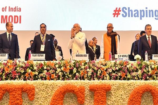 PM Modi along with other dignitaries at the 9th Global Vibrant Gujarat Summit in Gandhinagar. (@narendramodi/Twitter)
