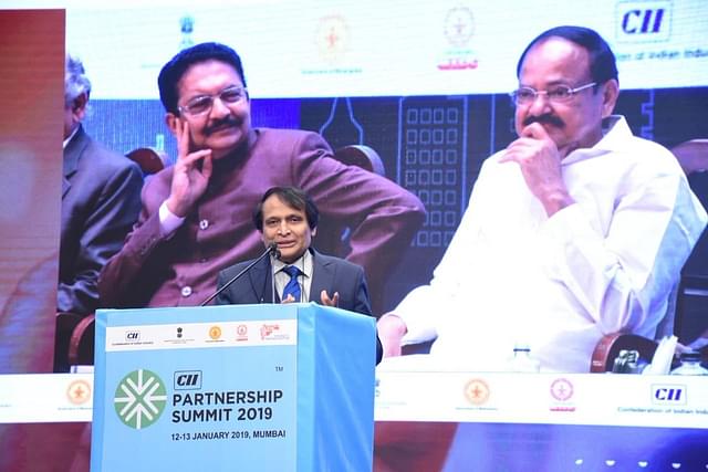 Union Minister Suresh Prabhu speaking at The Partnership Summit in Mumbai. Image courtesy of twitter.com/sureshpprabhu.
