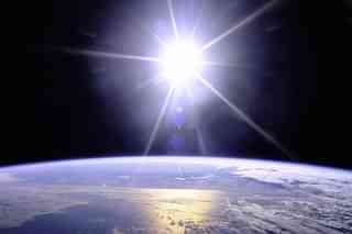 Sunburst over the Earth. (Image Credits: NASA)