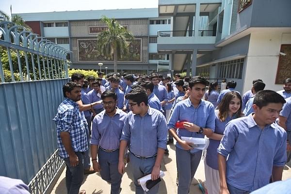 Students emerging after giving examination (Sushil Kumar/Hindustan Times via Getty Images)