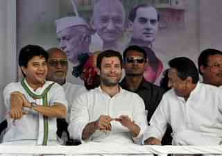 Rahul Gandhi (C) with Madhya Pradesh CM Kamal Nath (R) and Congress leader Jyotiraditya Scindia (L) (Arun Mondhe/Hindustan Times via Getty Images)