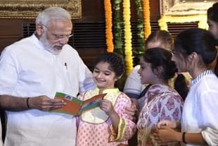 PM Modi with children in New Delhi. (Photo by Arvind Yadav/Hindustan Times via Getty Images)