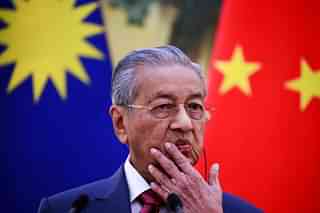 Malaysian Prime Minister Mahathir Mohamad gestures as he speaks during a press conference at the Great Hall of the People in Beijing.&nbsp; (How Hwee Young - Pool/Getty Images)&nbsp;