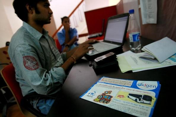 A redBus employee at the company’s Bengaluru headquarters (Representative image) (Uriel Sinai/Getty Images)
