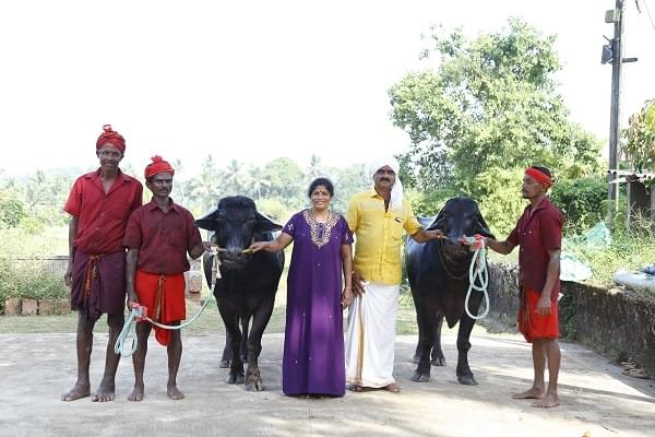 Alva and his wife with their ‘sons’ and their caretakers. 