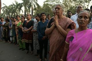 Ayyappa devotees and members of Sabarimala Achara Samrakshana Samithi protest against the Kerala government in Navi Mumbai. (Bachchan Kumar/Hindustan Times via Getty Images)