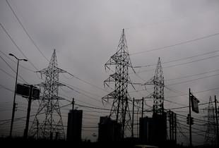 Representative image of electricity towers in Gurugram. (Photo by Priyanka Parashar/Mint via Getty Images)