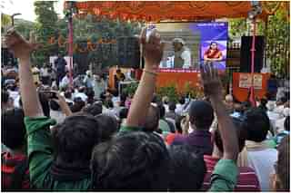 People gather to witness live telecast of swearing-in ceremony of Narendra Modi as as 15th Prime Minister of India (Subrata Biswas/Hindustan Times via Getty Images)