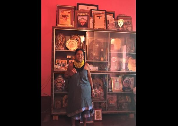 Sukri with her awards that she has lost count of