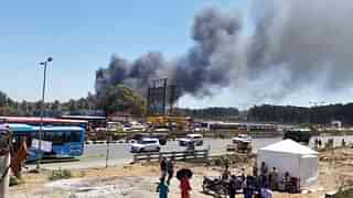 Fire at G5 parking gate entry of Aero India (Pic: Twitter)