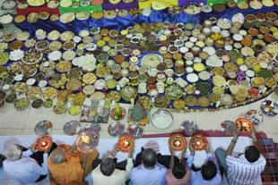 More than 500 recipes being presented to Lord Swaminarayan as offering at Swaminarayan Temple on the occasion of Annakut Utsav in Kolkata, India. (Subhendu Ghosh/Hindustan Times via GettyImages) 