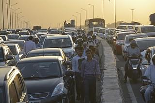 A massive traffic jam seen at the New Delhi-Ghazipur Bridge near UP Gate (Sakib Ali/Hindustan Times via Getty Images)