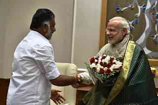 Tamil Nadu Deputy Chief Minister O Panneerselvam meeting PM Modi (@PIB_India/Twitter)