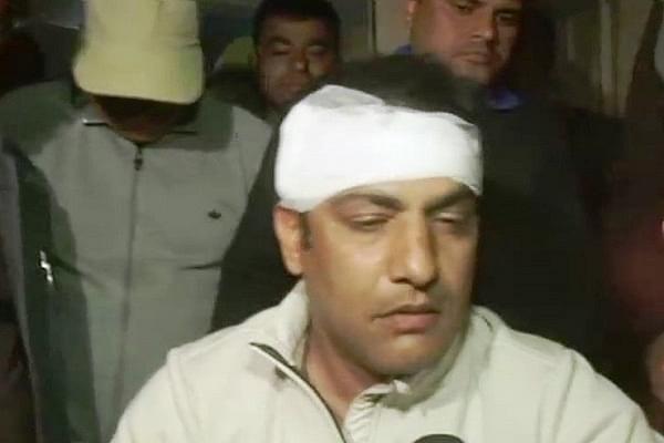 Amit Bhandari, the 40-year-old selector, after receiving four stitches on his head at Sant Parmanand Hospital  (image-ANI/Twitter)