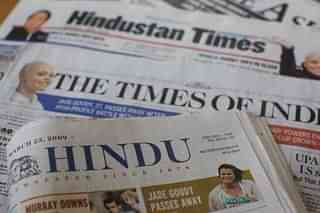 Popular Indian newspapers at a stall. (Daniel Berehulak/GettyImages)