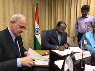ISRO chairman K Sivan (R) and <a href="https://twitter.com/JY_LeGall">Jean-Yves Le Gall‏ (L) signing agreement (Source: @<b>JY_LeGall</b></a>/Twitter)