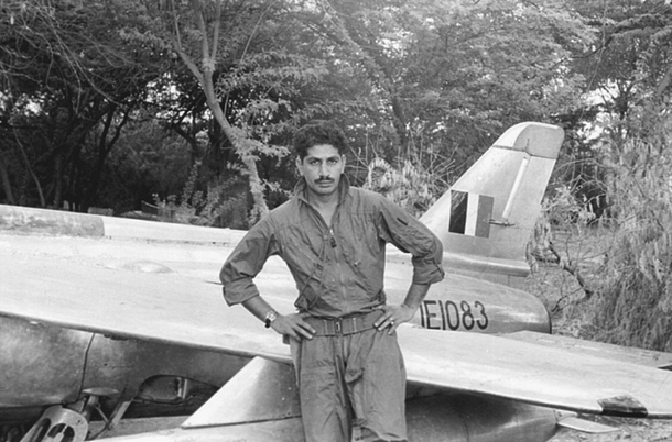 PAF Flight Lieutenant Hatmi stands beside the Gnat of the IAF captured in Pasrur. 