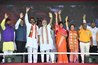 Prime Minister Narendra Modi with Kanchan Kul and other senior party members during an election rally.