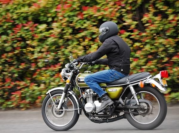 A motorcycle rider wearing a helmet. (Wikimedia Commons)