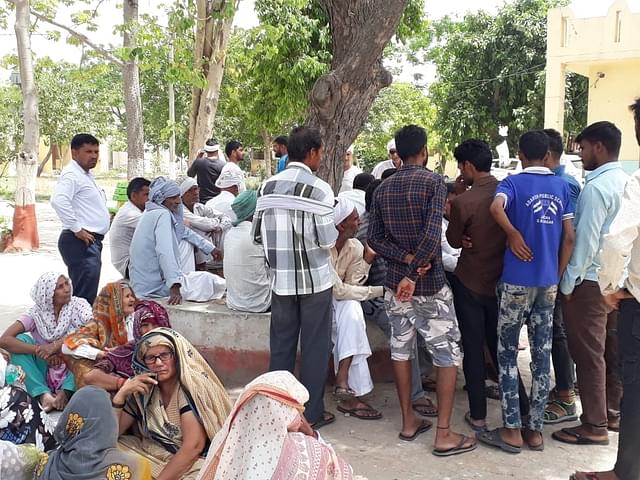 Villagers of Khurshidpura  outside the Jarcha police station on April 28