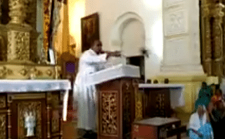 A screenshot from the video-clip of the Padre addressing church flock to not vote for BJP (via Twitter)