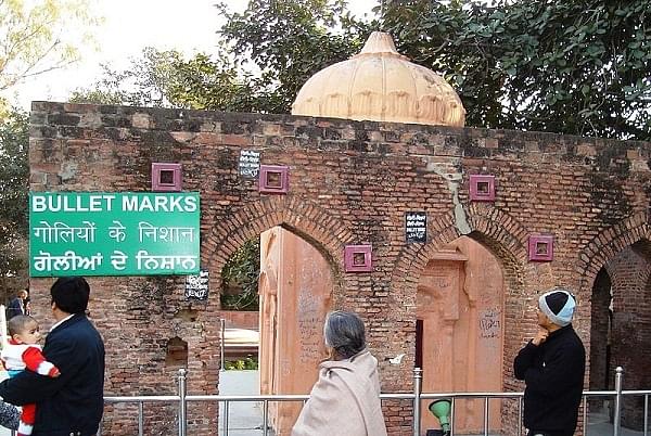 Visitors at the Jallianwala Bagh Memorial. (Vinoo202 via Wikipedia)