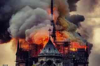 Fire engulfing Notre Dame cathedral (Pic Via Twitter)
