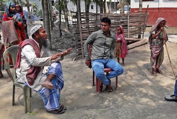 Amir Hussein Sheikh (in skull cap) (Credit: Abir Bhattacharjee) 