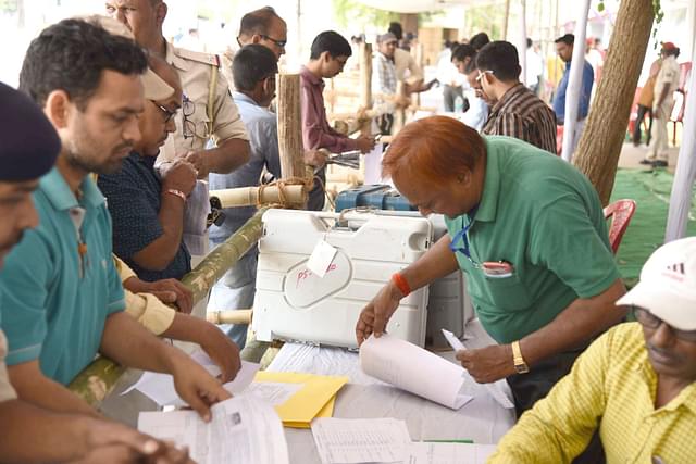 Polling officials checking the EVMS and other necessary inputs required for the General Elections-2019, at the distribution centre, at Gaya, in Bihar on 10 April 2019 (Photo Via PIB)