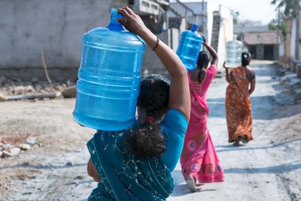 Women fetching water from a reverse osmosis plant at Jangalapalli village in Andhra Pradesh’s Guntur district. Women now have to trudge barely 250 metres against 4-5 km earlier before the water plant was set up. 