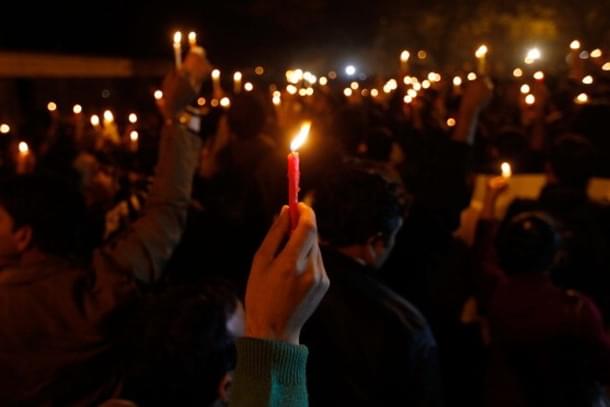 A candlelight vigil condemning crimes against women. Picture for representation