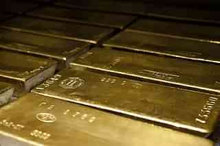 Gold bars arranged in rows. (Wikimedia Commons)