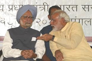 Manmohan Singh (L) and Narendra Modi (SAM PANTHAKY/AFP/Getty Images)) 