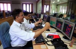 Stock traders rejoice at Bombay Stock Exchange. (Anshuman Poyrekar/Hindustan Times via GettyImages)