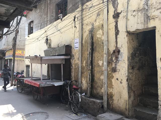 View of outside Jehangir Khan’s house. The <i>thela</i> is of Mohammad Alam. Both are in jail