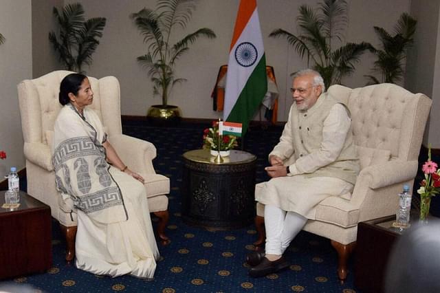 Prime Minister Narendra Modi with Bengal Chief Minister Mamata Banerjee. (Aripta Lahiri/Facebook)