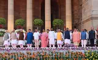 Prime Minister Narendra Modi with his new cabinet colleagues. (@PMOIndia)