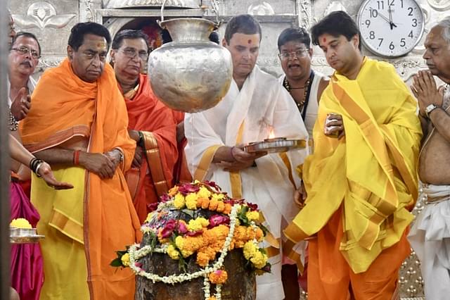 Congress president Rahul Gandhi offering prayers at the Mahakal temple in Ujjain before the Madhya Pradesh assembly elections. (Mujeeb Faruqui/Hindustan Times via GettyImages)