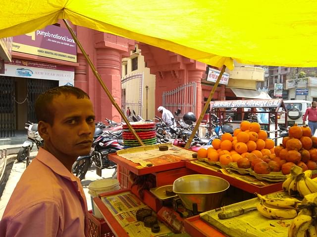 Satish Sonkar’s fruit stall just outside the temple. (Prakhar Gupta/Swarajya)